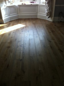 Fitting distressed engineered wood flooring on the south side