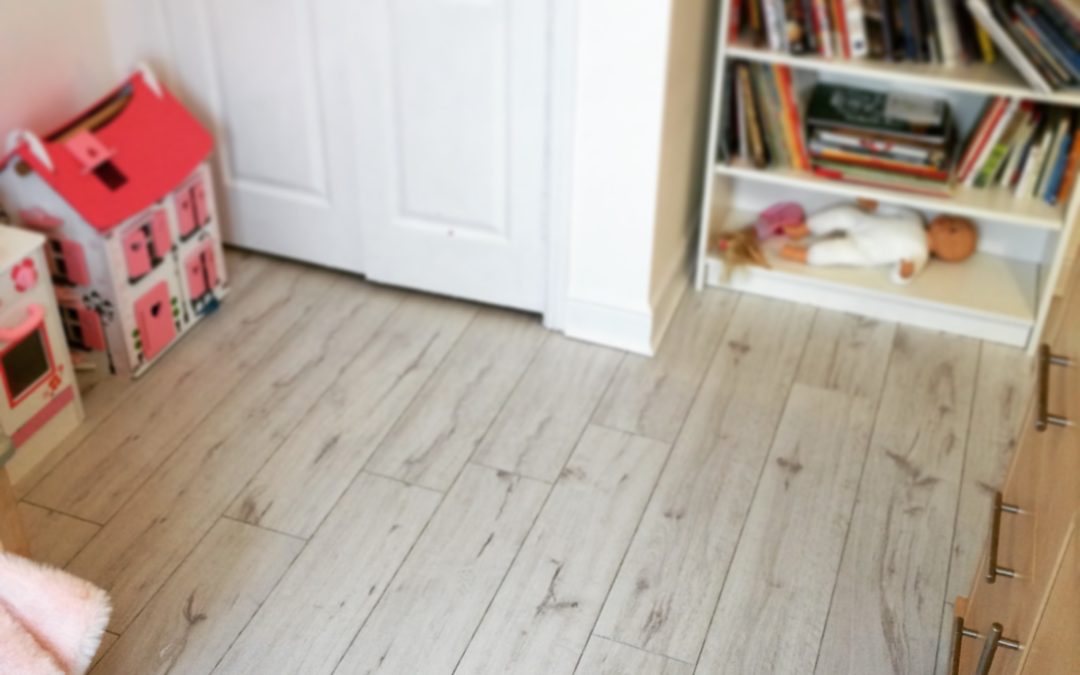 Installing White Laminate Flooring in a Child’s Bedroom
