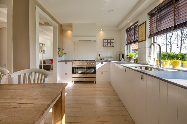 white dirty kitchen with a roll-up window