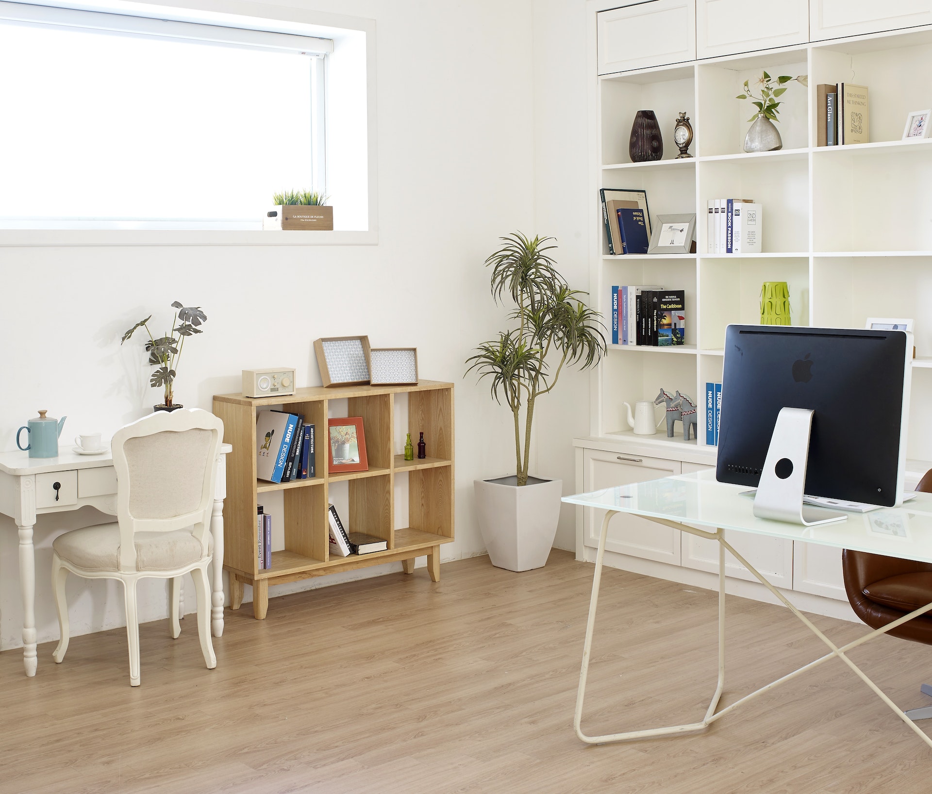 brown wooden floor in office - First Floors